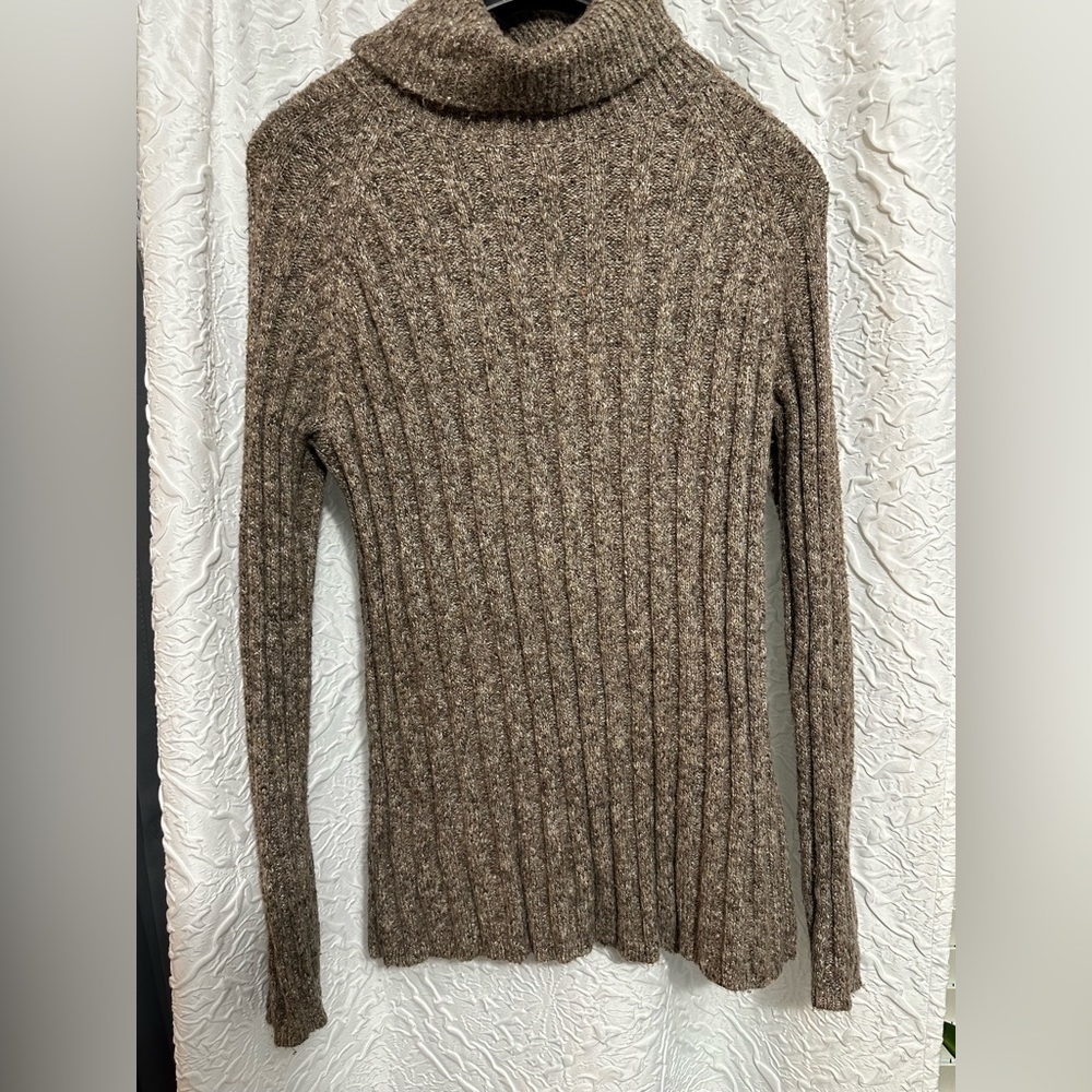 Turtle neck sweater.